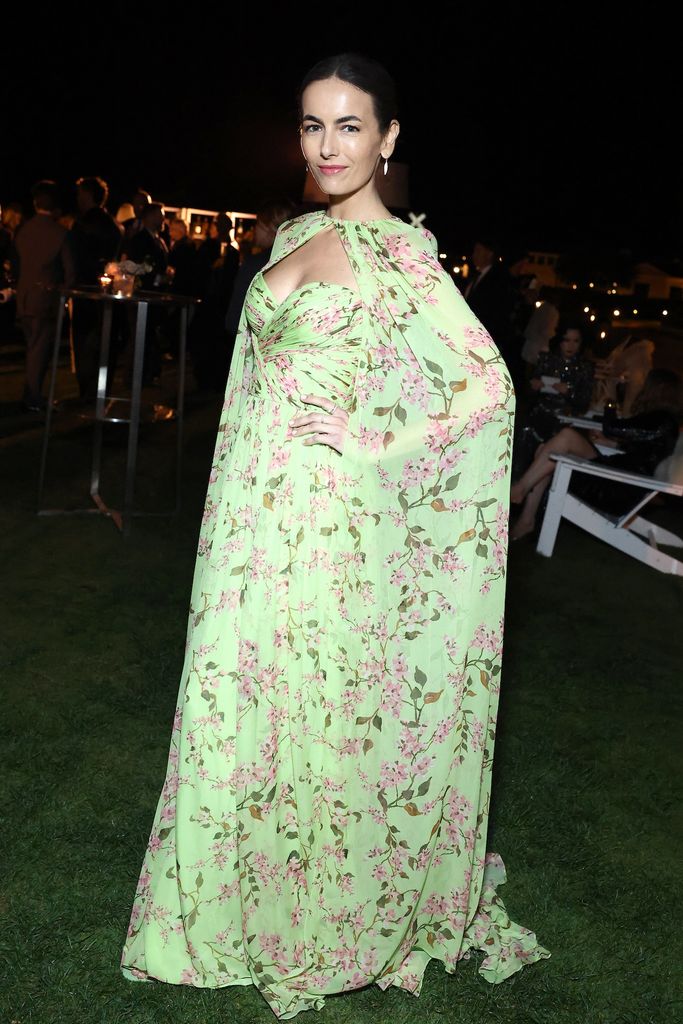 Camilla Belle Makes Rare Red Carpet Appearance Stunning in Floral Cape