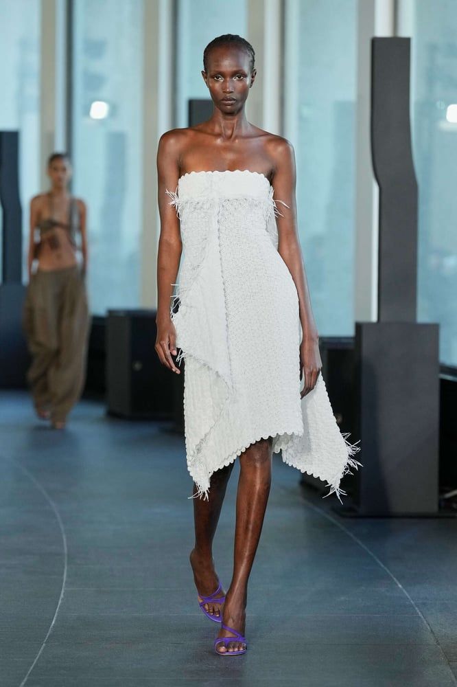 Paris Fashion Week's Grand Finale: Esber's Island Escape Meets CFCL's Knitwear Artistry