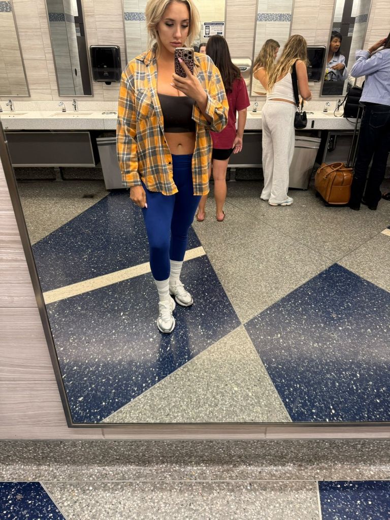 Playboy Model Questions Airline Dress Code After Being Asked to Fasten Shirt