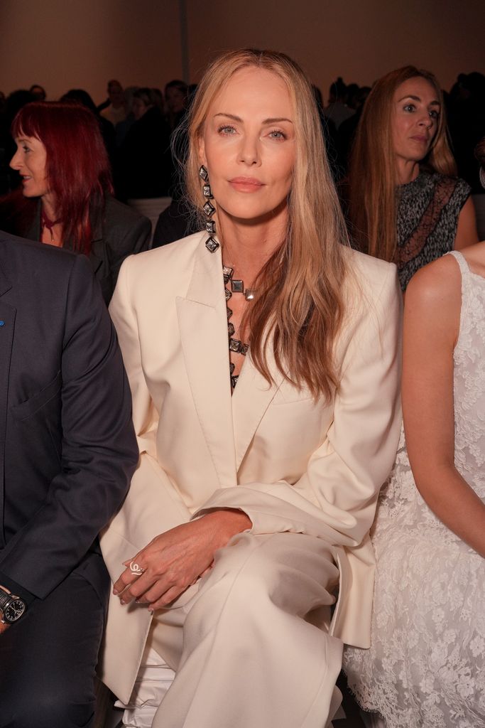 Theron Gives Depp the Cold Shoulder at Dior Show Amid Amber Heard Fallout