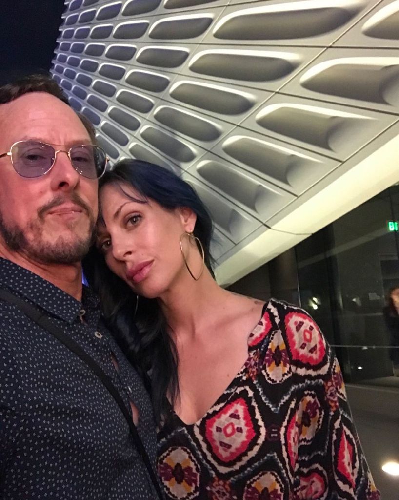 Weezer Bassist's Wife Jillian Lauren Faces Legal Battles Amidst Health Crisis and Divorce Filing